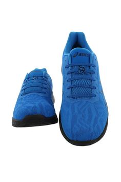 a pair of blue sneakers with black soles