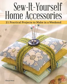 the cover of sew - it - yourself home accessories book, with buttons on pillows