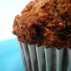 a muffin sitting on top of a blue plate