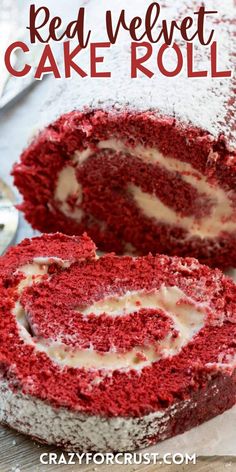 red velvet cake roll is cut in half and ready to be eaten