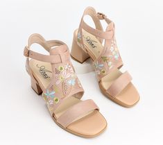 If you're a romantic at heart, you'll absolutely love the way that these embroidered heeled sandals bring a graceful elegance to any outfit. From Azura by Spring Step. Elegant Open Toe Heels With Floral Embroidery, Embroidered Heels For Summer Evenings, Elegant High Heel Embroidered Sandals, Embroidered Heels For Evening, Summer Season, Embroidered Heels For Evening Events In Summer, Elegant Summer Heels With Embroidery, Formal Open Toe Heels With Floral Embroidery, Elegant Embroidered Summer Heels, Elegant Embroidered Open Toe Sandals