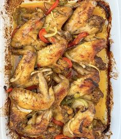 chicken with peppers and onions in a casserole dish