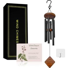 the wind chime is next to its box and note card with it's name