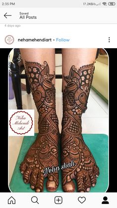 the feet are decorated with henna