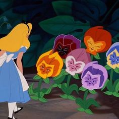 alice and the seven dwarfs standing in front of flowers