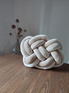 a large knot sitting on top of a wooden table