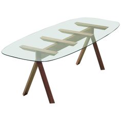 a glass table with wooden legs and an arrow design on the top, against a white background