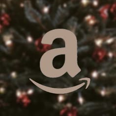 an amazon christmas tree with the letter a on it's front and bottom half