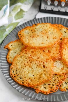 some crackers are on a plate and ready to be eaten