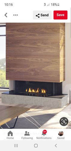 a modern fireplace in a living room with wood paneling on the wall and floor