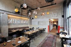 an empty restaurant with tables and chairs