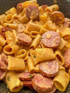 pasta with ham and cheese in a bowl