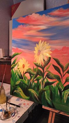 an oil painting of yellow flowers in front of a pink sky