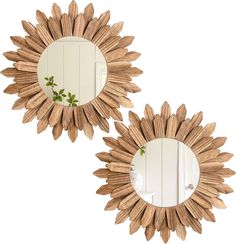 two mirrors that are sitting on top of each other in the shape of sunflowers