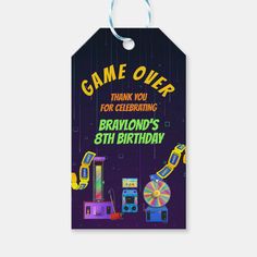 a birthday gift tag with the words game over and an image of toys on it