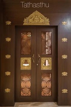 the front door is decorated with intricate designs