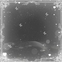 a black and white photo with butterflies in the sky above it is an ornate frame