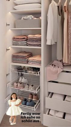 a doll is standing in front of a closet filled with clothes and other items on shelves