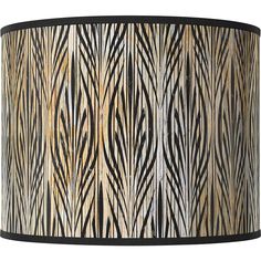 a lamp shade with black and white designs on it