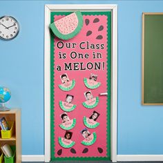 a classroom door decorated with watermelon slices and the words our class is one in a melon