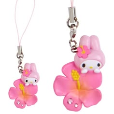 two hello kitty key chains are attached to each other's keysets, one with a flower and the other has a butterfly on it