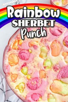 the rainbow sherbet punch cake is ready to be eaten with it's toppings