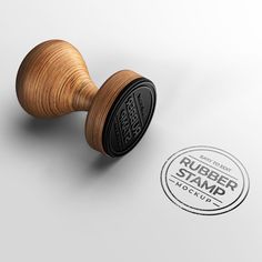 a rubber stamp with a wooden spool on it and the word rubber stamp next to it