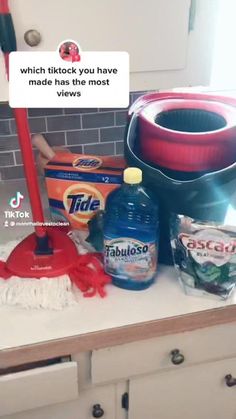 the kitchen counter is clean and ready to be used by someone with a mop