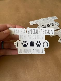 someone is holding up some stickers that say it takes a special person to speak for those without a voice