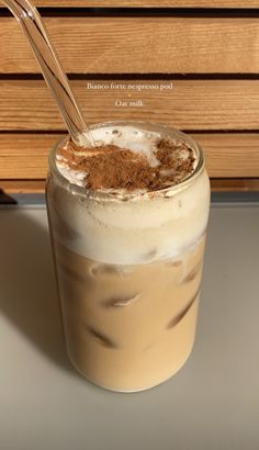 an iced drink with cinnamon and whipped cream