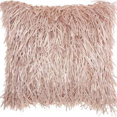 a pink pillow with long fringes on the front and back of it, against a white background