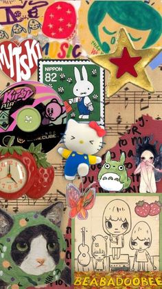 an assortment of stickers and magnets on top of a sheet of music paper