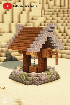 an image of a small house made out of wood and stone in the middle of a desert