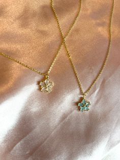 "Gorgeous dainty necklace featuring a gold plated dainty necklace chain and gorgeous pastel blue or pink flower pendant  Length: 15\" + 2\" extender" Dainty Rose Gold Flower Necklace, Light Blue Flower Jewelry For Spring, Dainty Gold Jewelry For Spring, Light Blue Jewelry For Spring Gift, Feminine Flower Pendant Necklace With Delicate Chain, Dainty Rose Gold Flower Necklace With Delicate Chain, Gold Flower Pendant Necklace For Spring, Gold Flower Necklace For Spring, Delicate Charm Necklace With Flower Pendant And Adjustable Chain