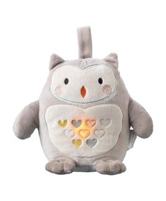 an owl shaped stuffed animal with hearts on it's chest