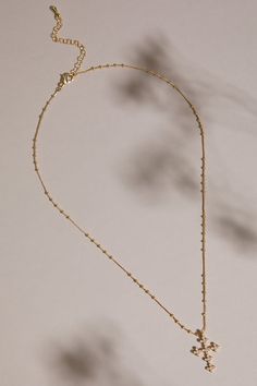 This 18k gold necklace features a delicate clover cross pendant suspended from a beaded ball chain. A perfect blend of elegance and charm, it adds a touch of faith and style to any ensemble. Beaded Ball, 18k Gold Necklace, Gold Cross Necklace, Gold Cross, Accessories Jewelry Necklace, Ball Chain, Cross Pendant, Cross Necklace, Jewelry Necklace Pendant