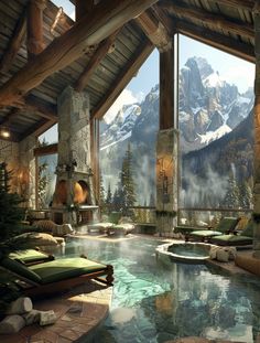 an indoor swimming pool with chaise lounges and mountains in the backgroud