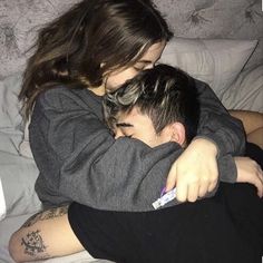 a man and woman cuddle in bed with the caption, wanna hug u and sleep