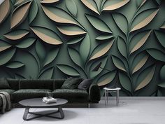 a living room with a couch, coffee table and wallpaper that looks like leaves