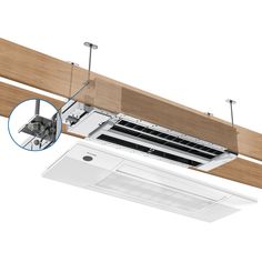 an air conditioner mounted on the side of a wooden beam and attached to a ceiling