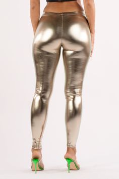 • Available in Multiple Colors• Highwaisted• Form fitting • Shiny metallic fabric• Elastic waistband• 96% Polyester, 4% Spandex• Imported 80s Vibes, Footless Tights, Metallic Leggings, Shimmer N Shine, Metallic Fabric, Wet Look, Halloween Cosplay, Ankle Length, Athleisure