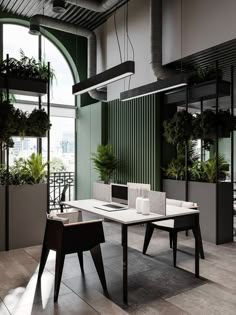 an office with plants on the windowsills and a table in front of it