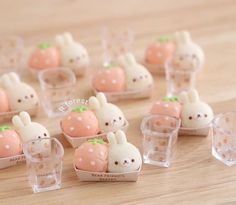 some little bunny shaped treats in small plastic containers