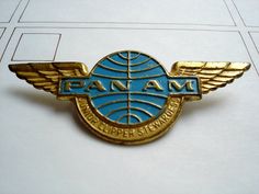 a pin with the words pan am on it