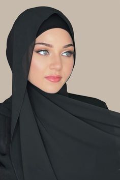 Our Luxury Chiffon Hijab-Black is perfect for every occasion. With the softest chiffon fabric we could find, our Luxury Chiffon will become your go to hijab whether you're going out to a fancy party or keeping it casual, looking beautiful is effortless!FABRIC & CAREFabric: Polyester Chiffon Dimension: 70"L x 27"WContour: Long RectangleThickness: LightTexture: SmoothFabric Care: Machine or hand wash in warm water, tumble dry or air dry, iron if needed.While we try our best to ensure product color Elegant Wedding Hijab, Elegant Evening Chiffon Abaya, Elegant Solid Color Wedding Abaya, Elegant Black Abaya For Formal Occasions, Elegant Black Formal Abaya, Elegant Solid Chiffon Hijab, Elegant Solid Color Chiffon Hijab, Elegant Black Abaya, Hijab Fabric