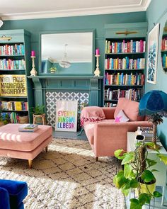 a living room filled with furniture and bookshelves