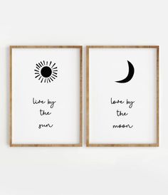 two black and white prints with the words love hug the moon on them, in wooden frames