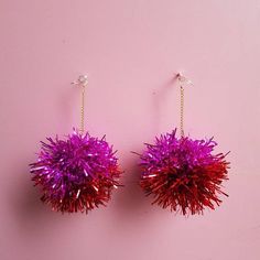 ▲ Pink & Red Tinsel Earrings ▲ Make a true statement with a pair of sparkly shiny tinsel earrings! Each pair of earrings are made by hand in our studio in Margate, UK making them truly unique ▲ About the Collection ▲ TINSEL! We here are Fat Pom Poms love tinsel. Whether you love it or hate it you cannot deny the ultimate sparkle it gives off whenever it moves. A few years ago we created our first Tinsel Earrings and not long after, guess who we spotted wearing them?! None other than the gorgeous Tinsel Earrings, Clover Pom Pom Maker, Tie Dye Heart, Fearne Cotton, Pom Pom Earrings, Pom Pom Maker, Earrings Fall, Tarnish Remover, Fall Styles