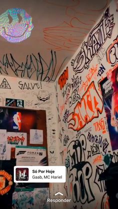 graffiti is on the walls of a bathroom