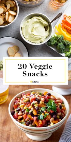 a bowl filled with veggie snacks next to bowls of vegetables and dips